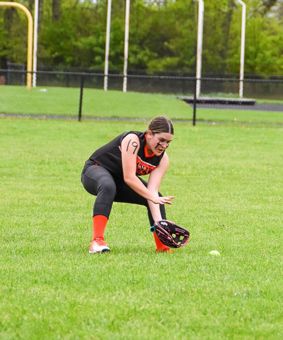 Youth softball action shot during game