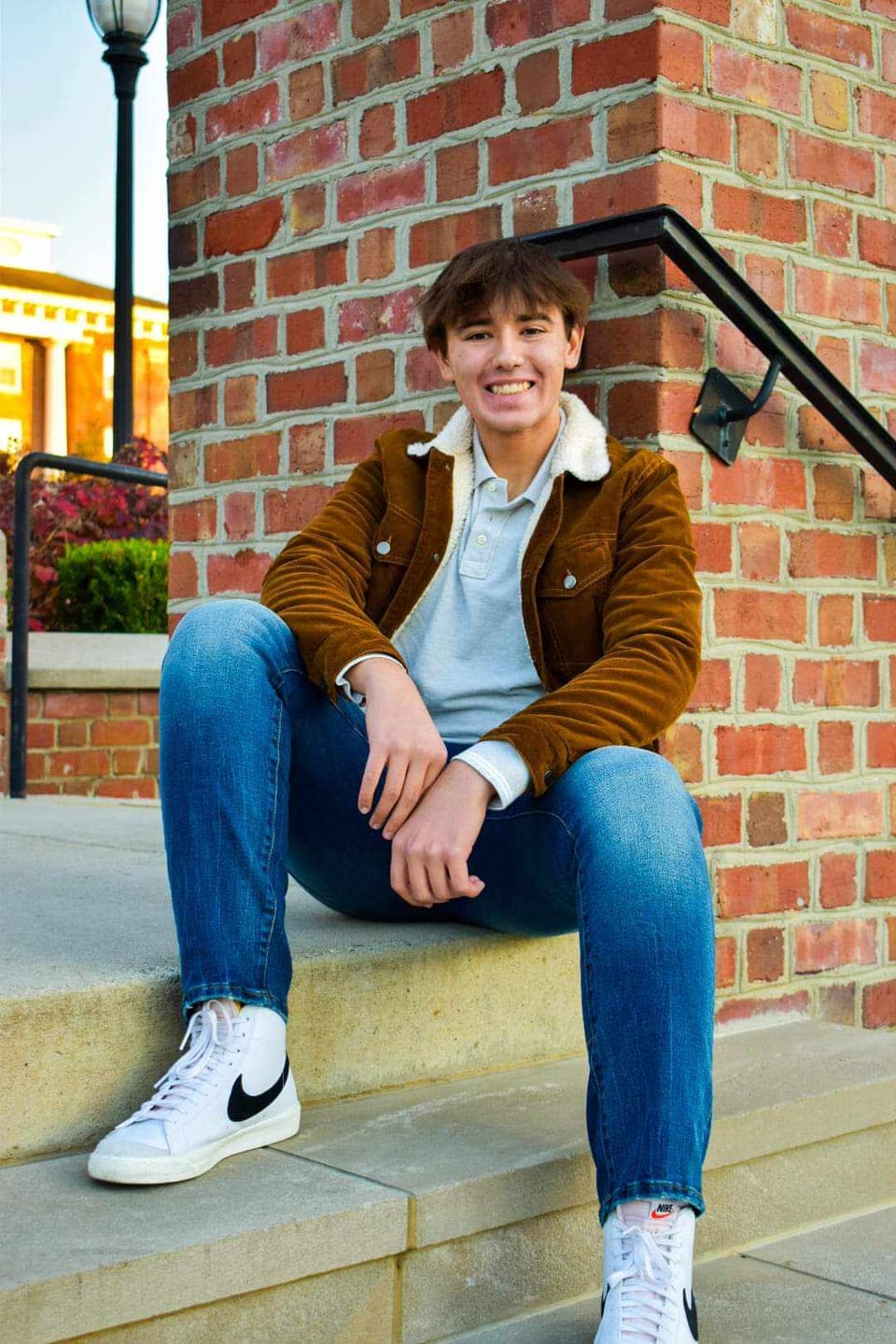 Senior portrait with natural outdoor backdrop